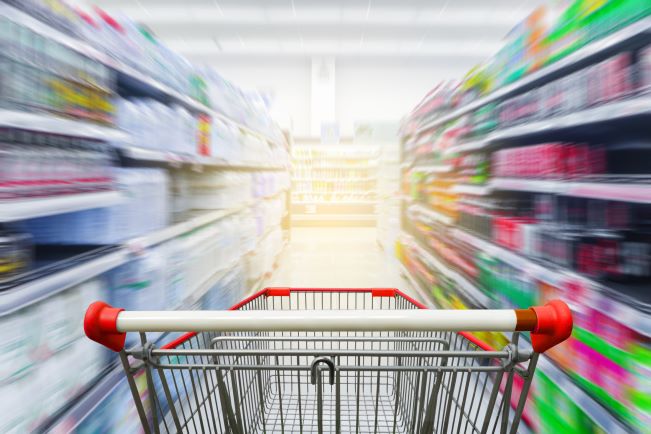 Blurred Shopping Lane with Cart